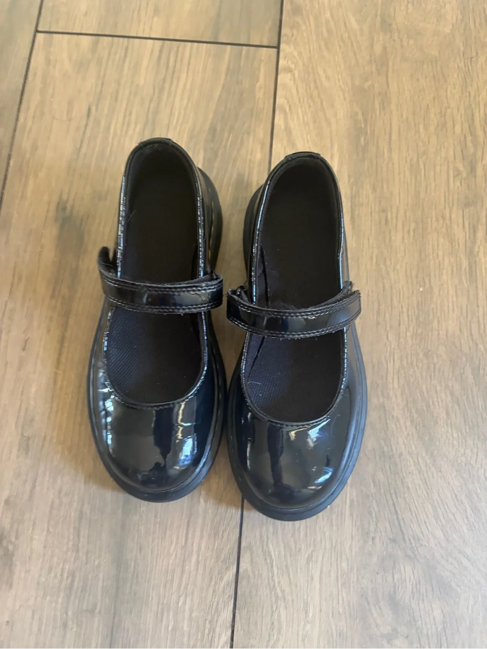 Dr. Martens Girls' Black Patent Mary Janes with Yellow Welt Stitching